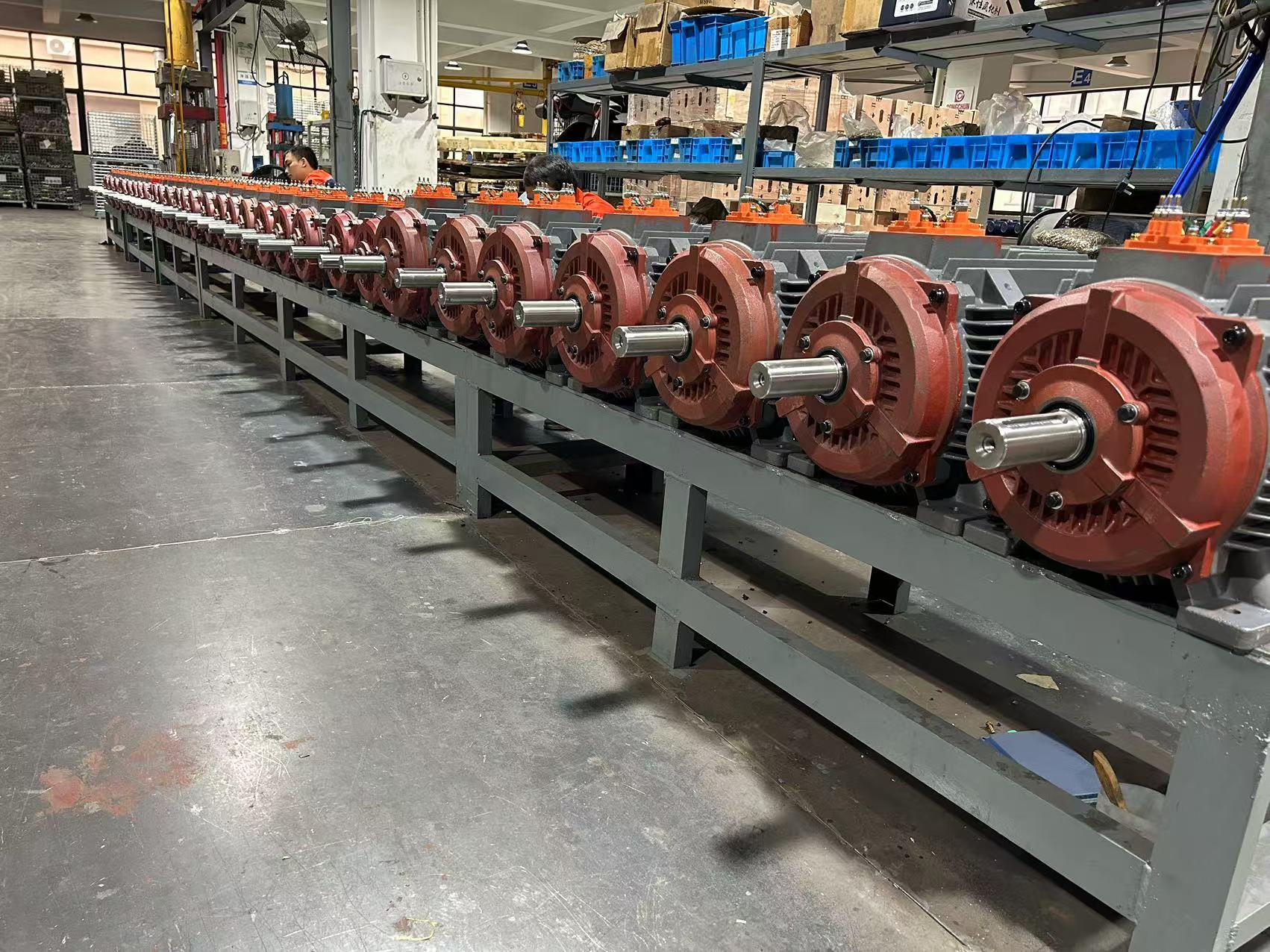 Diverse AC motors displayed on a factory floor